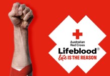 Raised fist with a red bandage on the forearm, set against a red background, next to the Lifeblood logo and the slogan 'Life is the reason'.