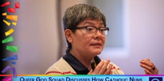 Speaker with short gray hair and glasses gesturing while talking; rainbow shapes along the left edge and a blue caption bar reading: 'Queer God Squad Discusses How Catholic Nuns Build Lifeline for Detained Immigrants.'