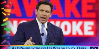Male speaker in a navy suit delivers a televised speech, with a bold red backdrop and a blue caption bar reading: 'As DeSantis Intensifies His War on Equity, Queer God Squad Says God’s Realm is Based on DEI'