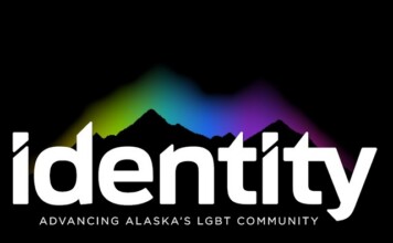 Identity logo: white 'identity' wordmark with a rainbow-colored mountain silhouette on black, plus the tagline 'Advancing Alaska's LGBT Community'.