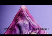 Woman in a pink veil over a corseted dress against a lavender backdrop; album title reads 'Madonna Confessions II' (implied without naming).