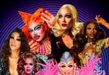 Group of drag queens posing in vibrant outfits against a blue circular-patterned backdrop.