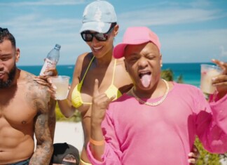 Prime Video Premieres “Pageant Queens: Our Story Behind the Crown” Three friends at the beach pose and sip drinks, with the ocean in the background and bright sunny weather时 (informative)
