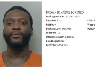 Mugshot of Andre Lorenzo Brown in an orange jumpsuit with booking details to the right (Booking Number 2026-013333, DOB 6/24/1992, In-Custody, Ready for Bond: Yes).