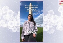 Woman in a patterned sweater stands outdoors on a grassy field with a tall obelisk; overlaid text promotes a rivalry lookalike contest and logos.
