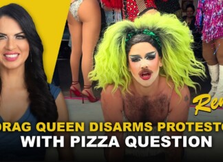 Smiling woman in blue on a yellow background beside a drag queen with neon green hair; headline reads Drag Queen Disarms Protestor With Pizza Question.