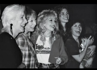 Sally Field’s Son Jokes How Growing Up on ‘Steel Magnolias’ Set Made Him Gay Five women posing and laughing together at a social event, enjoying the moment in a candid black-and-white photo.