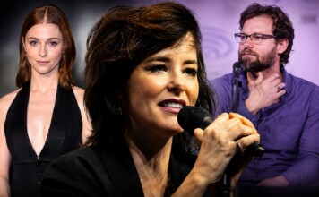Deep Inside Hollywood: Audrey Hepburn Biopic, ‘Las Malas,’ Parker Posey, Nick Jonas & More Entertainment News Female singer in front holding a microphone, flanked by a red-haired woman in black on the left and a bearded man with glasses on the right at a panel event.