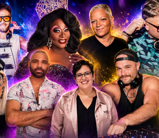 Eight club DJs and drag performers pose around a colorful stage with a mixer in the foreground.