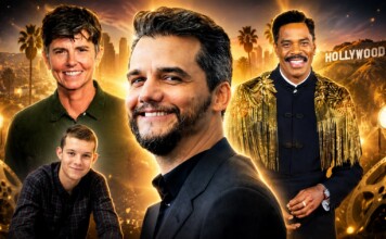 Group portrait of four men smiling against a golden Hollywood skyline and film reels backdrop, like a movie poster.