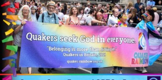 Diverse marchers hold a rainbow banner reading 'Quakers seek God in everyone' at a Pride parade; bottom bar promotes LGBTQ+ rights.