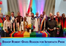 Group of diverse clergy around a rainbow altar at an interfaith Pride ceremony, banner below reads 'Bishop Robert Gives Reason for Interfaith Pride'.