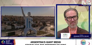 Split-screen news shot: left shows a giant statue of a soccer player in a blue-and-white jersey; right shows a male anchor with glasses.