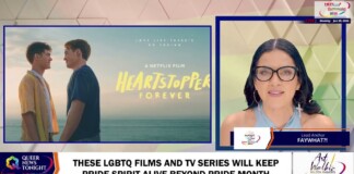 Split-screen TV segment: left shows the Heartstopper poster with two men facing at the beach; right shows a female host with glasses in a geometric studio backdrop.