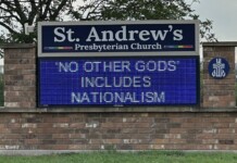 St. Andrew's Presbyterian Church sign with a blue LED marquee displaying: 'NO OTHER GODS INCLUDES NATIONALISM' on a brick base.