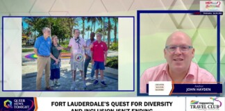 Television news split-screen: outdoor press conference on the left with five people at a podium, and a studio anchor in a pink shirt on the right.