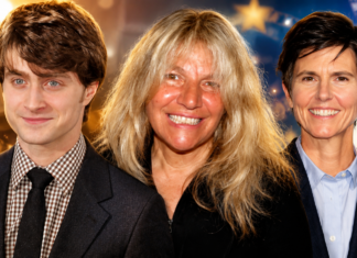 Three smiling adults posing for a group photo at an event, standing close together against a festive background.