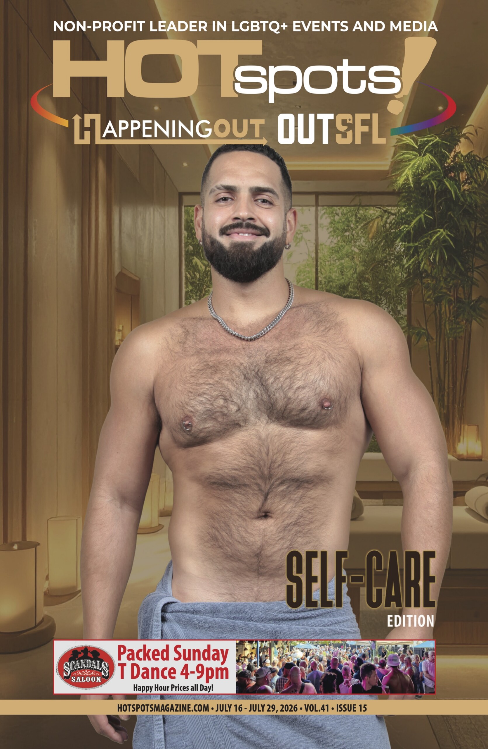 Magazine cover featuring a smiling shirtless man with a towel tied around his waist in a spa-like setting; title reads HOTspots and Self-Care edition.