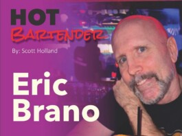 Hot Bartender: Eric Brano Poster for 'HOT BARTENDER' featuring Eric Brano; by Scott Holland, with a man in a bar posing with a drink in the foreground.