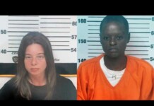 Side-by-side mugshots against a height chart: left, a light-skinned woman with shoulder-length brown hair in a black shirt; right, a dark-skinned man with short hair wearing an orange jumpsuit over a white shirt.