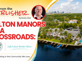 From The Publisher: Wilton Manors At a Crossroads – Investing in The Community We Love Promotional banner: Wilton Manors at a Crossroads with a portrait, city skyline, and waterway image; bold red title and crest logos.