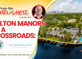 From The Publisher: Wilton Manors At a Crossroads – Investing in The Community We Love Promotional banner: Wilton Manors at a Crossroads with a portrait, city skyline, and waterway image; bold red title and crest logos.