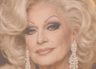 Grand Dame: Episode 6 – “The One Man I Never Outgrew” Close-up portrait of a glamorous older woman with platinum blonde hair and diamond earrings.