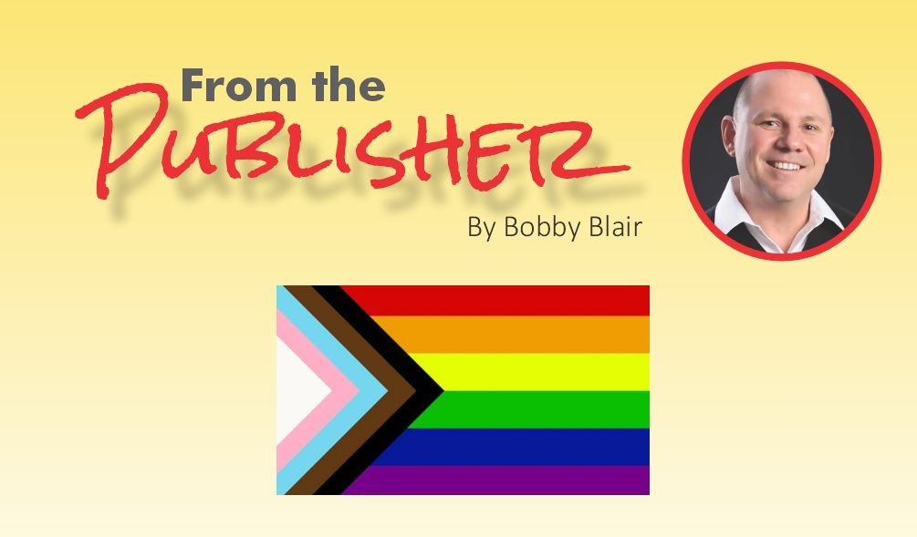 SM_From the Publisher_4116 REVISED Header banner reading 'From the Publisher' with 'By Bobby Blair,' a circular portrait on the right, and a rainbow Pride flag graphic in the center.