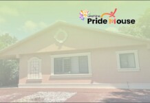 Small single-story house with light trim and a Pride House logo in the top-right corner.